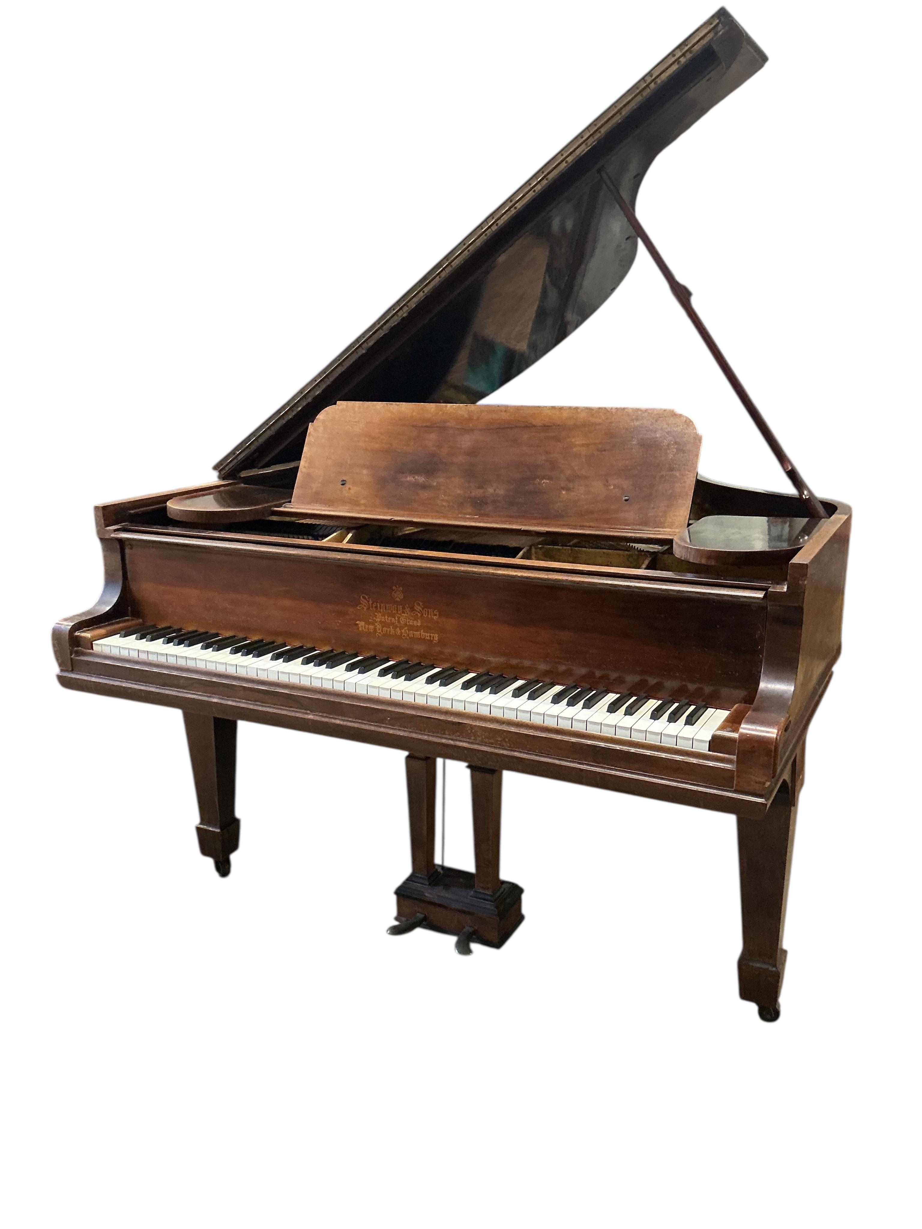 A Steinway rosewood grand piano, length 180cm, width 143cm, height 98cm CITES Submission reference QSWF2A3L